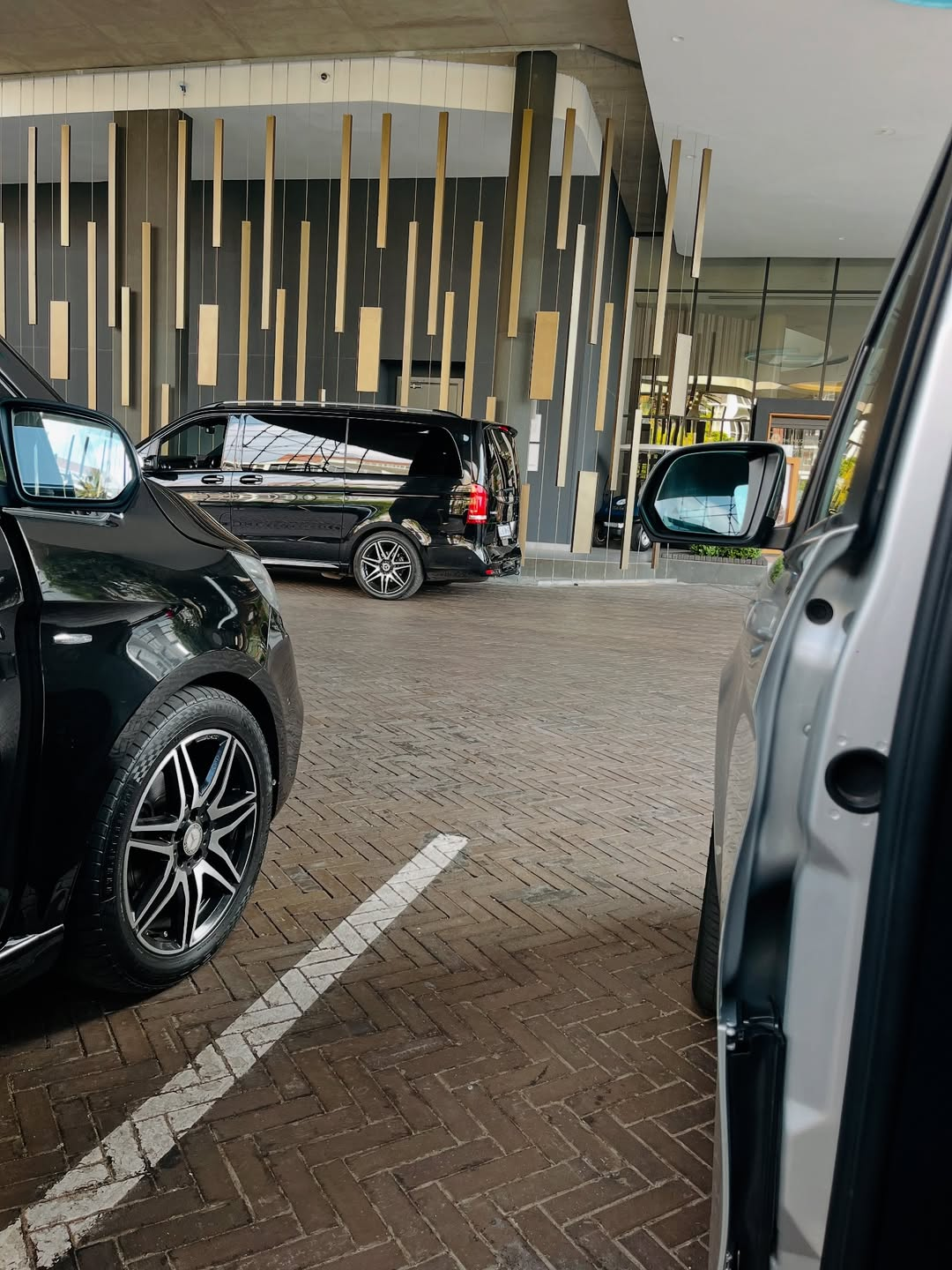 Mercedes V-Class parked under a hotel portico