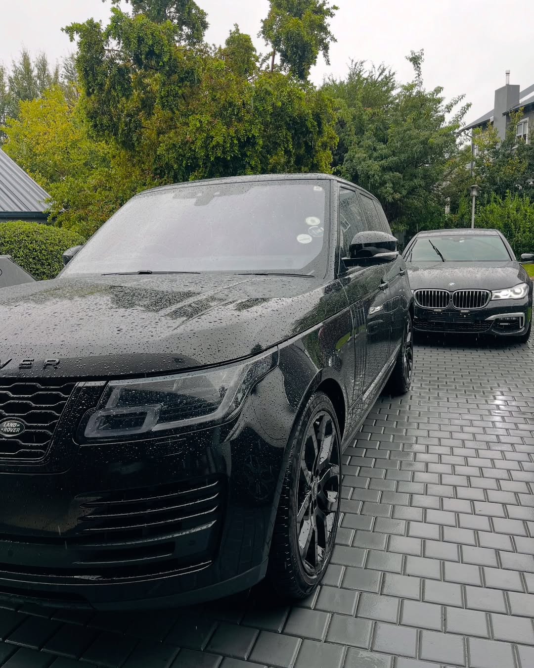 Range Rover and BMW sedan from the hire fleet