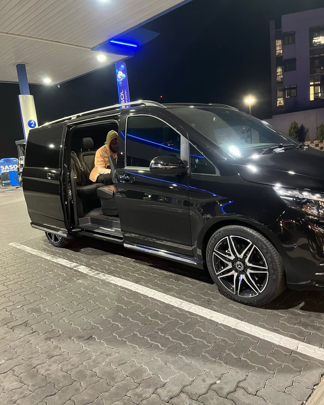 Black V-Class on a late-night transfer stop